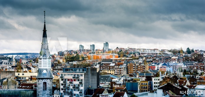 Picture of Tower of Notre-Dame des Rcollets church and cityscape of Verviers with a dramatic sky